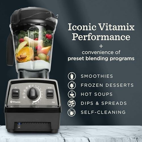 Vitamix blender with preset blending programs and fruits inside.